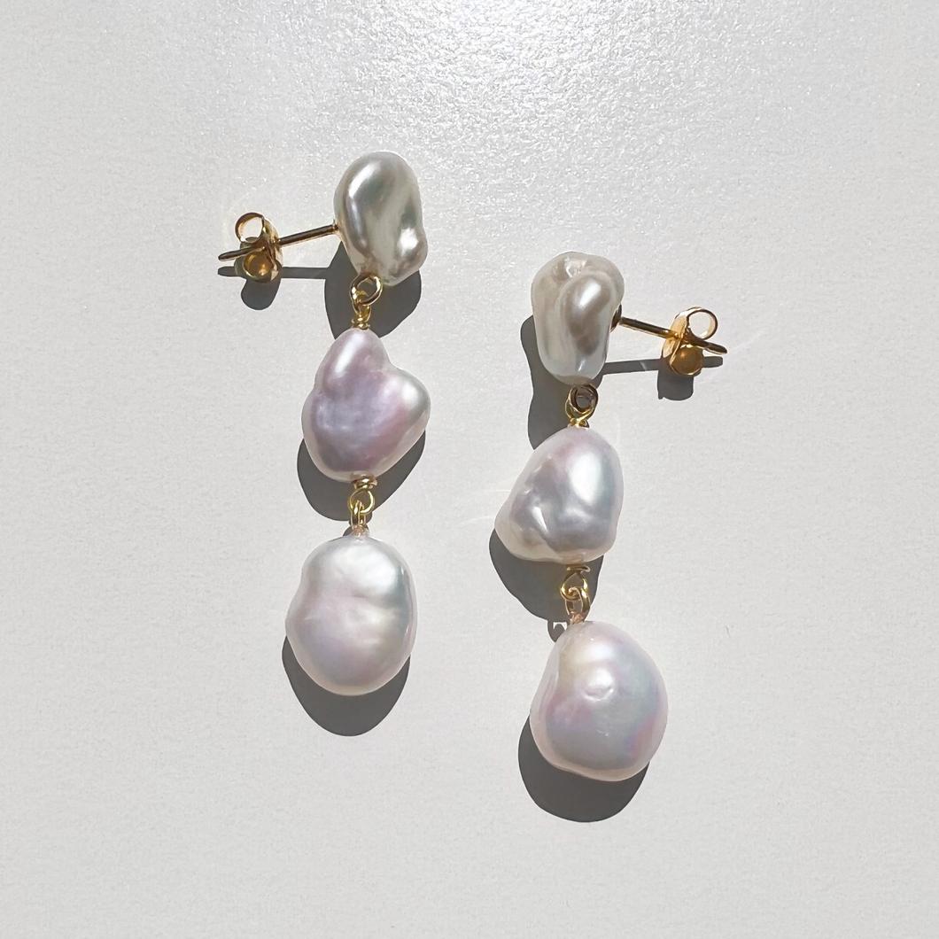 Ffeaturing beautiful nuggets pearls connecting as drop earrings by Debbie Debster